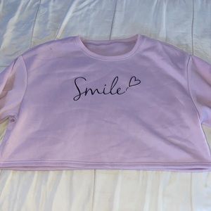 Large Lavender long sleeve crop top with “Smile” on it